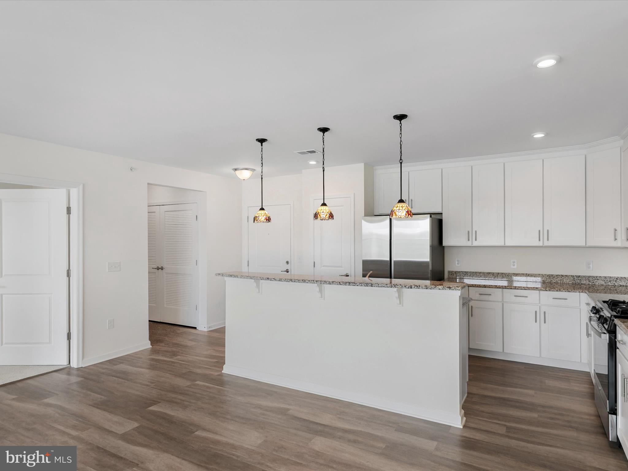 20141 Riesling Lane, Unit 401 Lewes, DE 19958 - Photo 9 of 49 Bi-Level Breakfast Bar