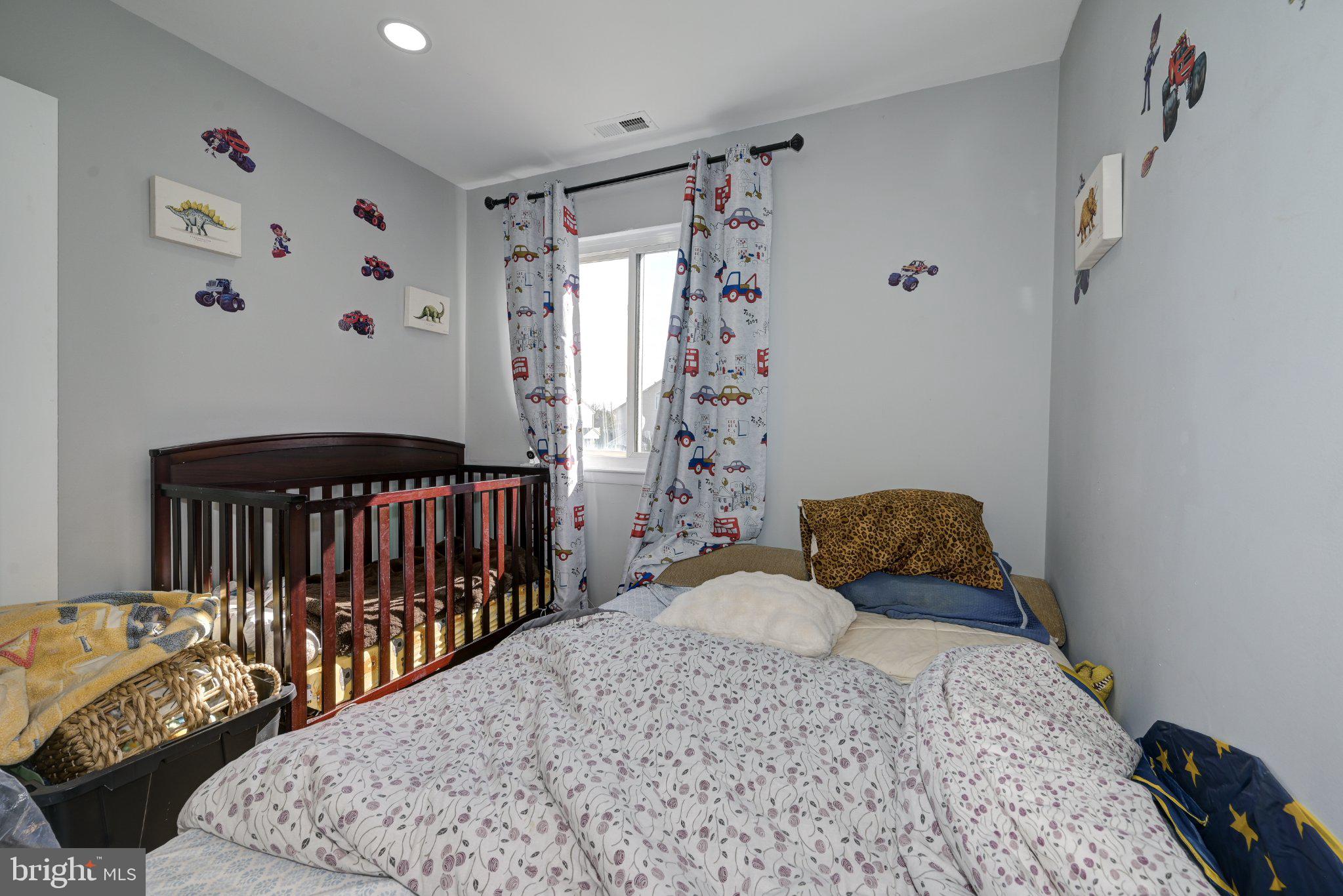 75 Sandra Road Voorhees, NJ 08043 - Photo 18 of 25 a bedroom with a bed and a window