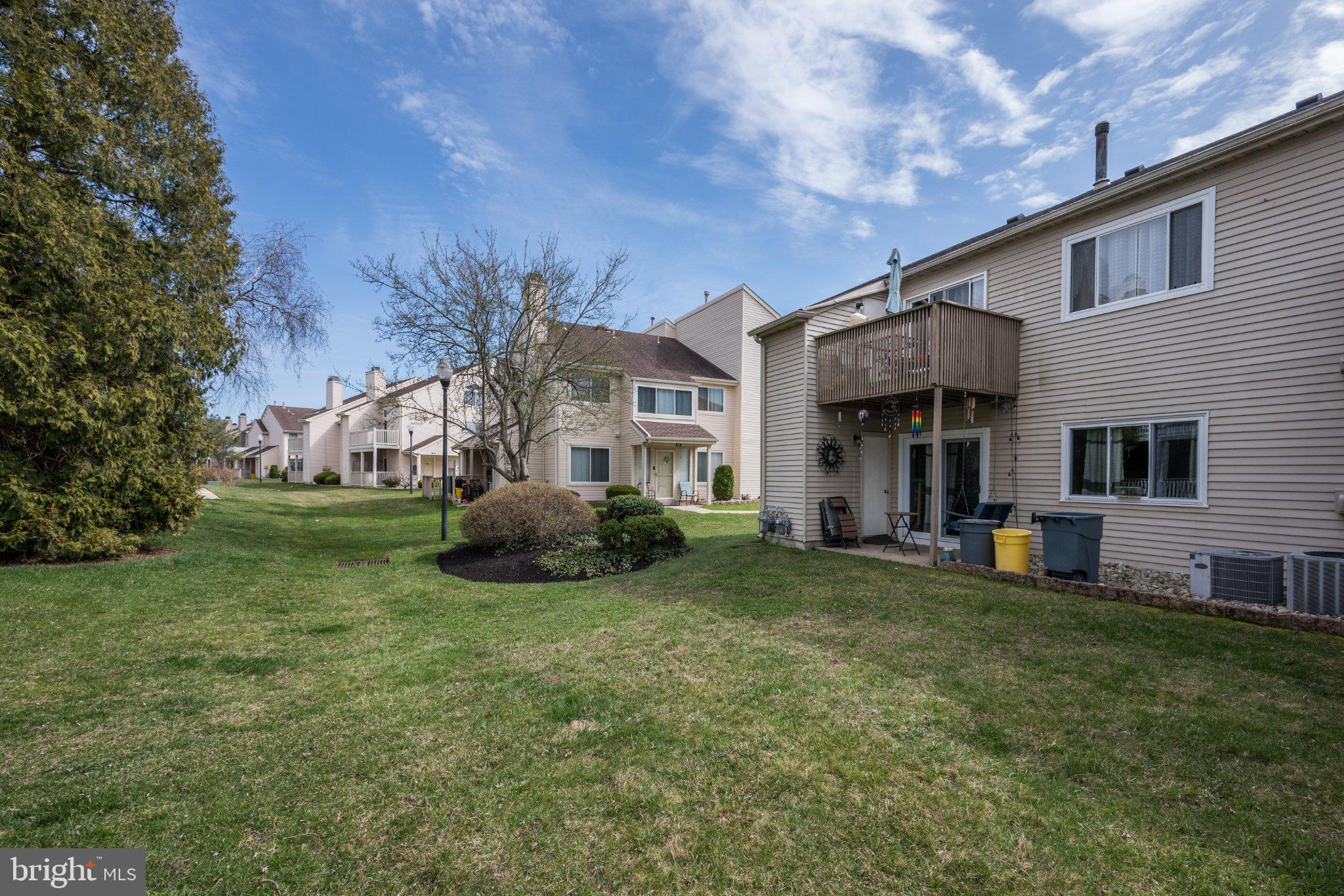 75 Sandra Road Voorhees, NJ 08043 - Photo 25 of 25 a view of a house with a yard and sitting area