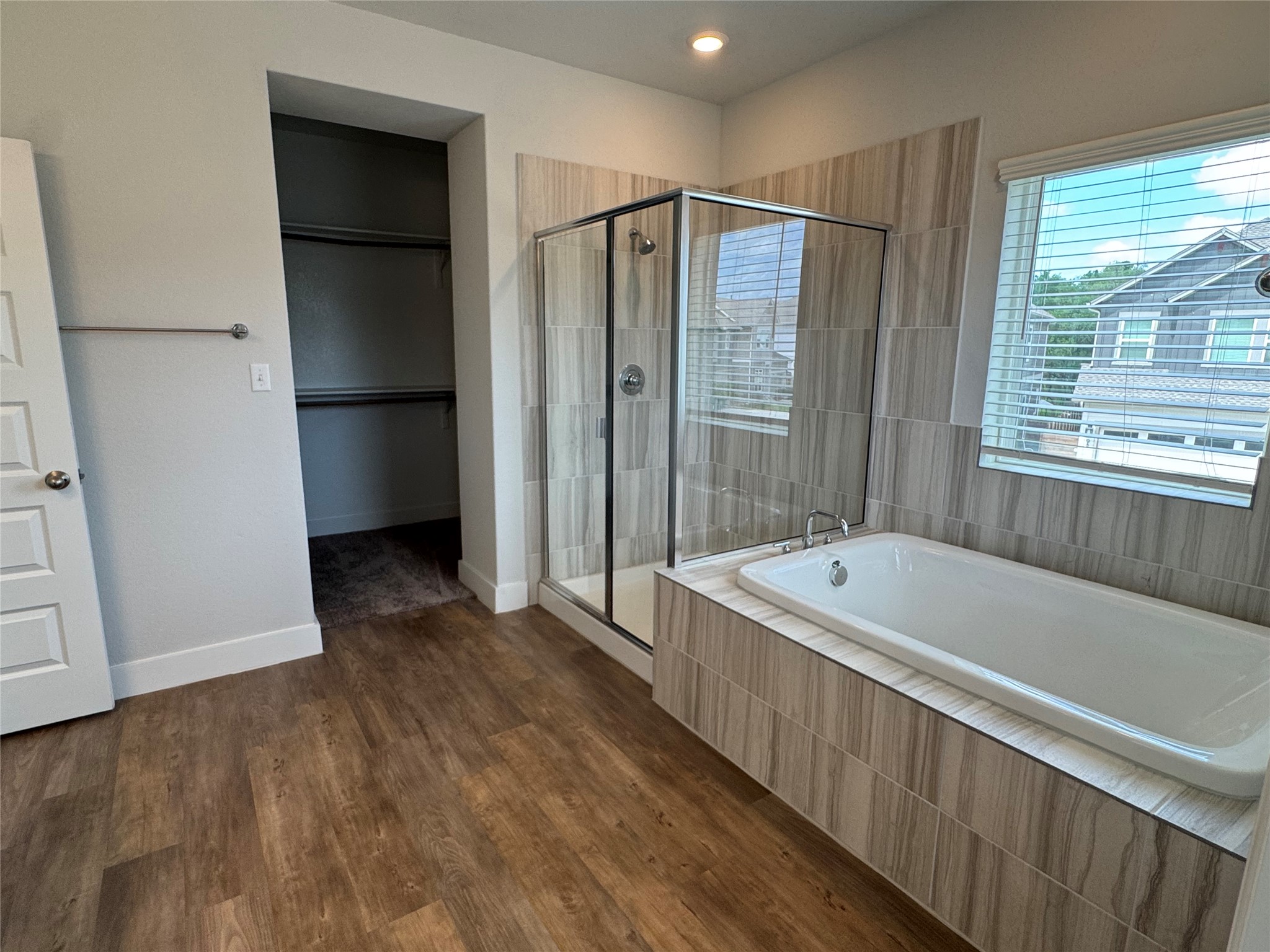 3000 Chisholm Trail Road, Unit 33 Round Rock, TX 78681 - Photo 19 of 31 a bathroom with a tub shower and sink