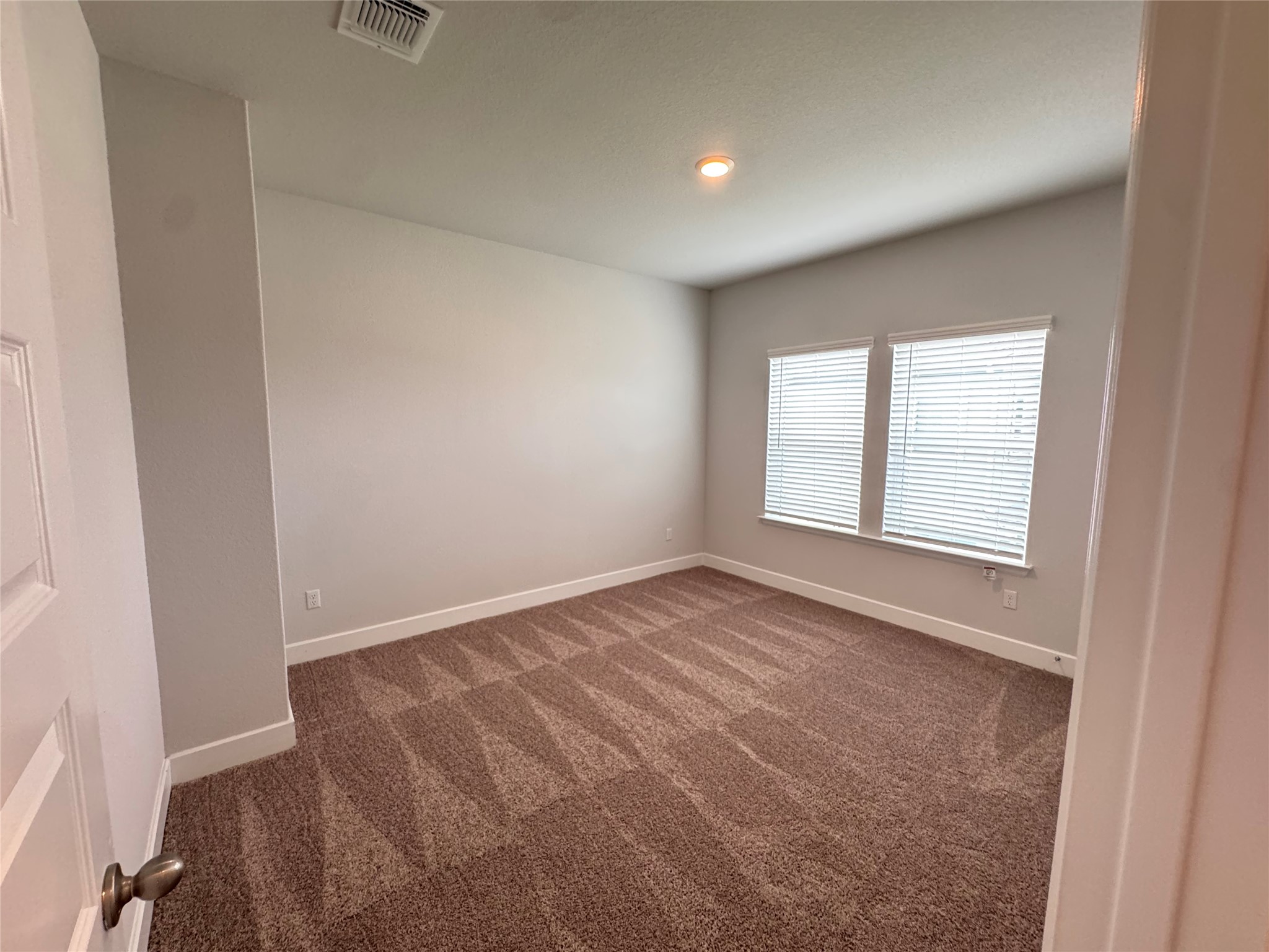 3000 Chisholm Trail Road, Unit 33 Round Rock, TX 78681 - Photo 28 of 31 an empty room with windows