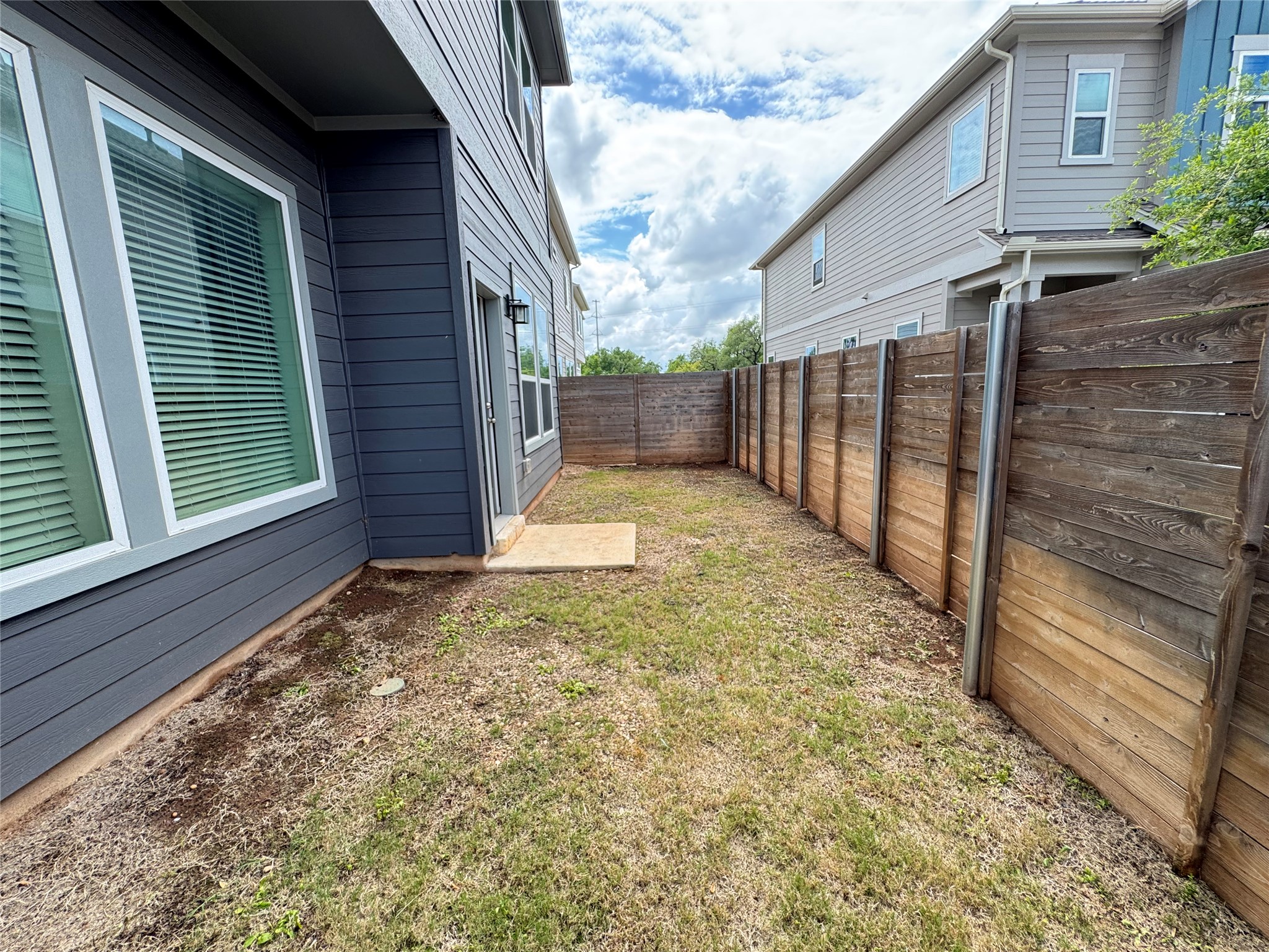3000 Chisholm Trail Road, Unit 33 Round Rock, TX 78681 - Photo 30 of 31 a view of backyard with green space