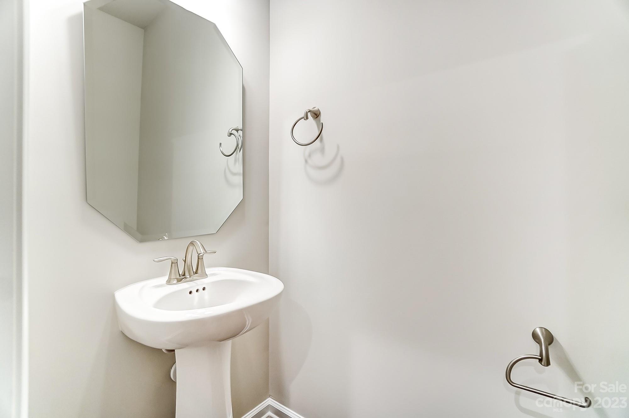 15317 Braid Mdw Drive, Unit 170 Charlotte, NC 28278 - Photo 12 of 29 a bathroom with a sink and mirror