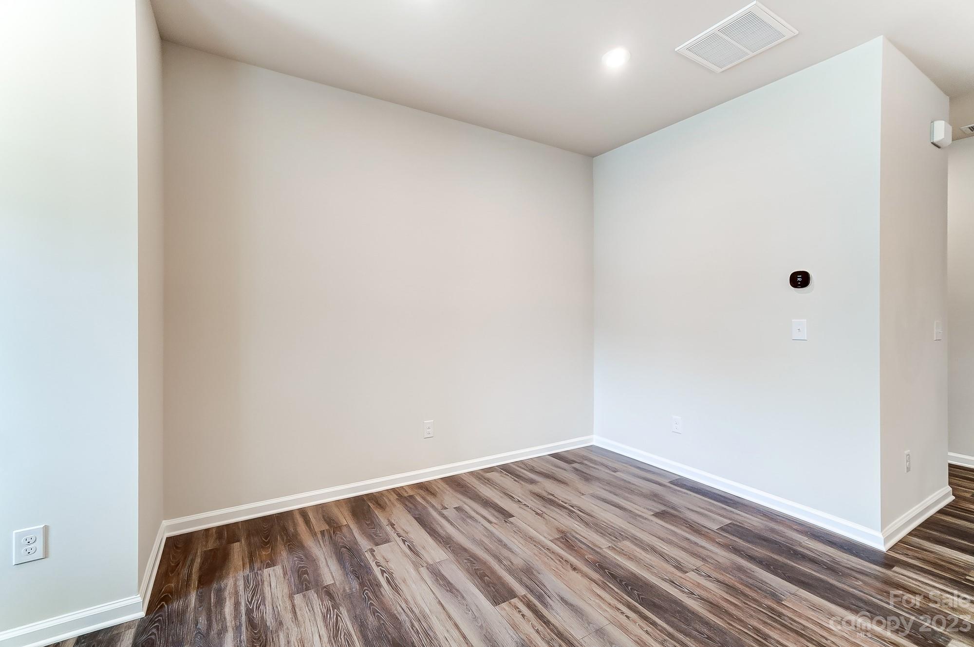 15317 Braid Mdw Drive, Unit 170 Charlotte, NC 28278 - Photo 26 of 29 a view of room with wooden floor