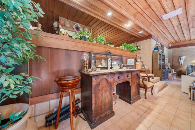 a outdoor living space with patio furniture and a potted plant