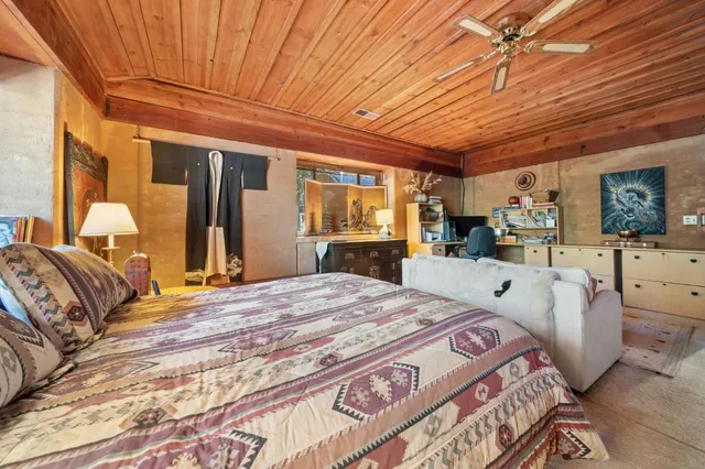 a view of a chairs and table in a patio