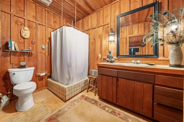 a kitchen with a sink and a stove