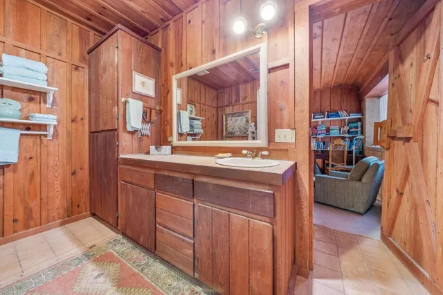 a house with trees in the background