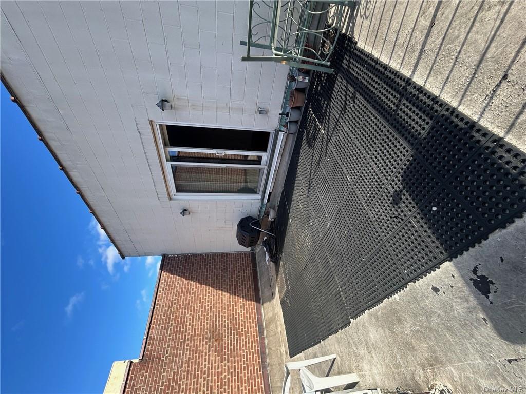 25 South Division Street Peekskill, NY 10566 - Photo 18 of 20 Wooden deck featuring a patio area