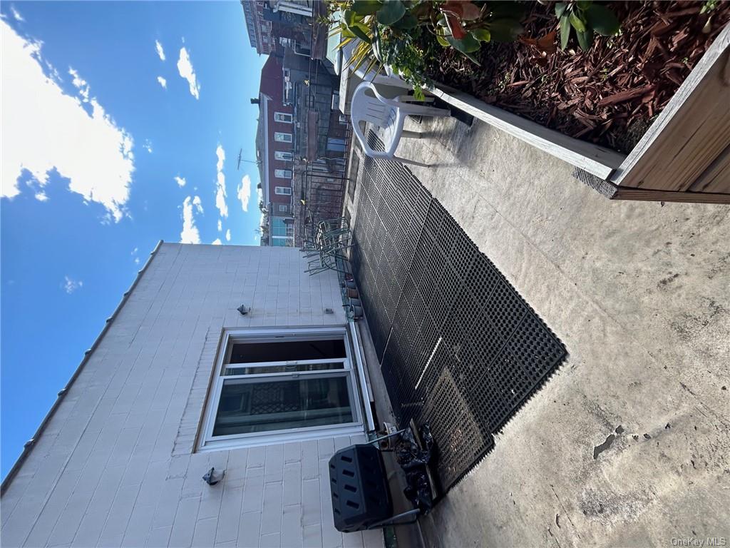 25 South Division Street Peekskill, NY 10566 - Photo 19 of 20 View of patio / terrace featuring a grill