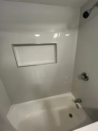 a bathroom with a bathtub