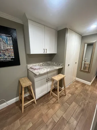 a workspace with furniture and window