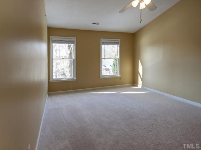 8404 Grey Abbey Place Raleigh, NC 27615 - Photo 8 of 12 Large master suite with a vaulted ceiling and a new ceiling fan!! Brand new carpet!