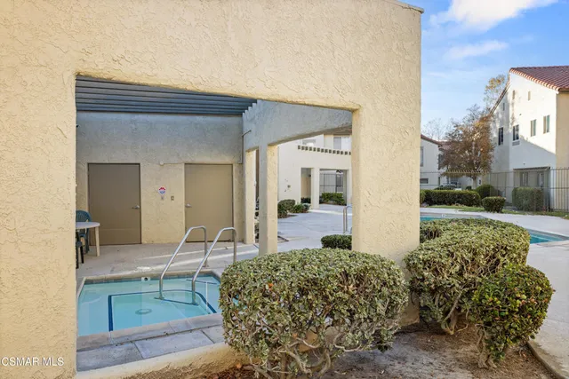 a living room filled with furniture and a table