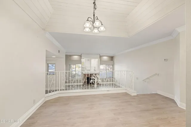 a very nice looking room with a chandelier