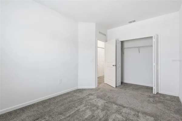 an empty room with closet