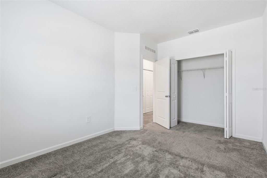 3303 Laurent Loop Davenport, FL 33837 - Photo 20 of 37 a view of an empty room