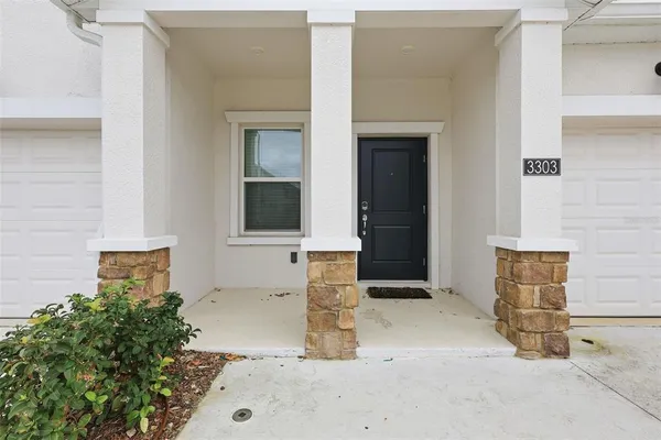 a view of entrance front of a house