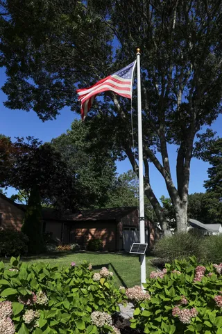 a backyard of a house with lots of green space