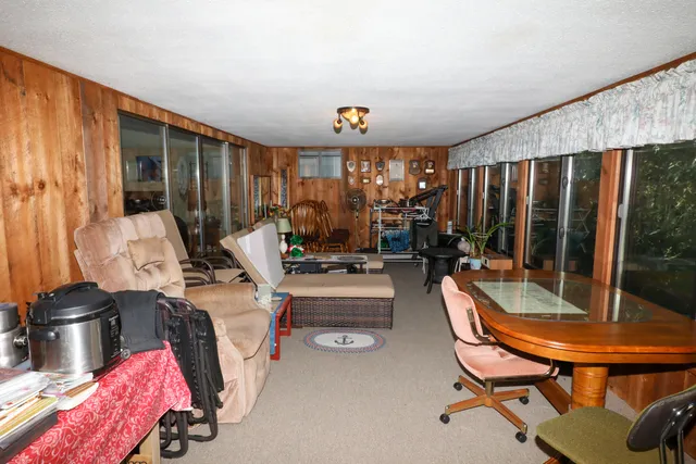 a view of a living room and dining room