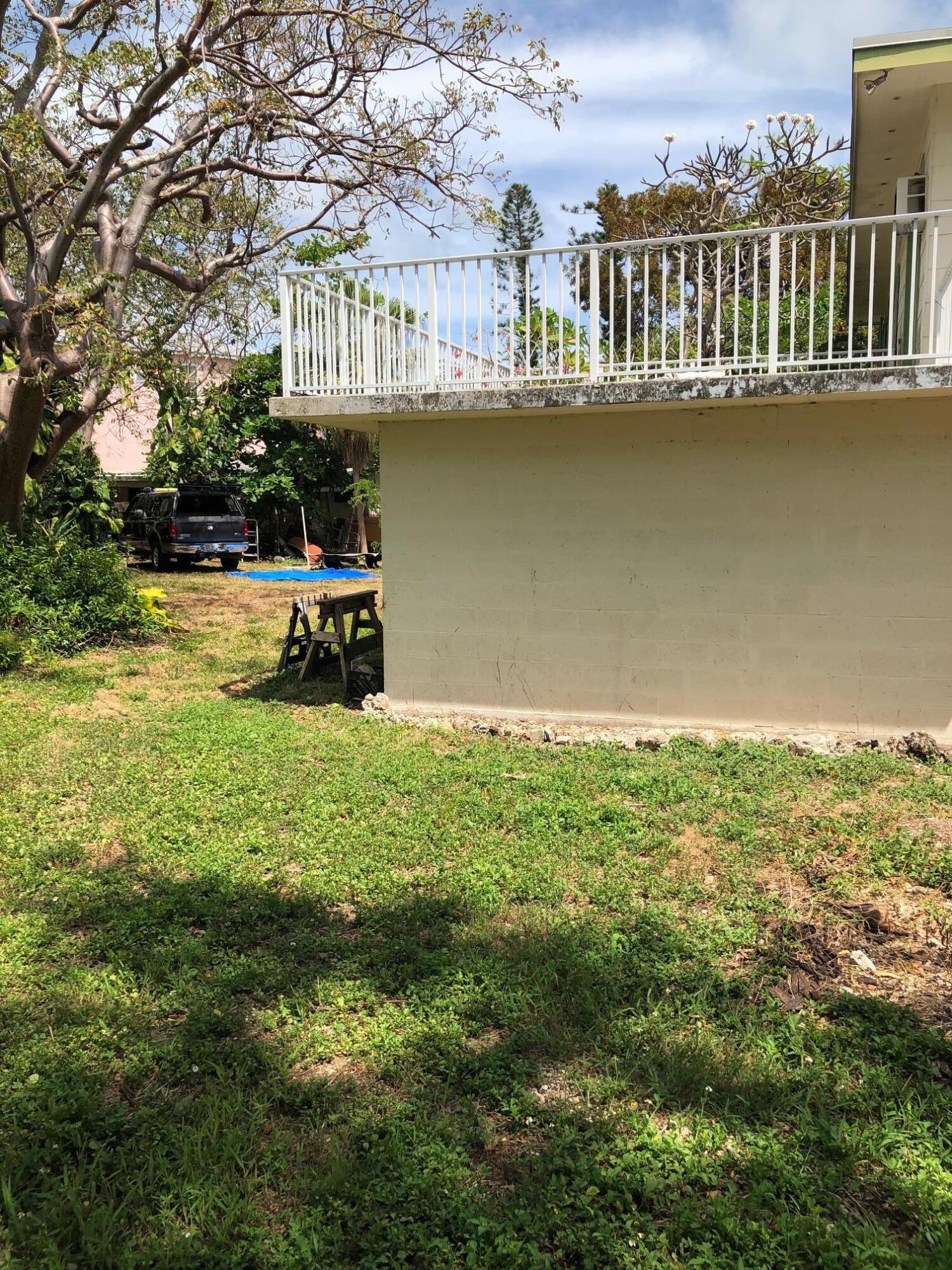 349 Sound Drive Key Largo, FL 33037 - Photo 5 of 16 a view of a house with a yard