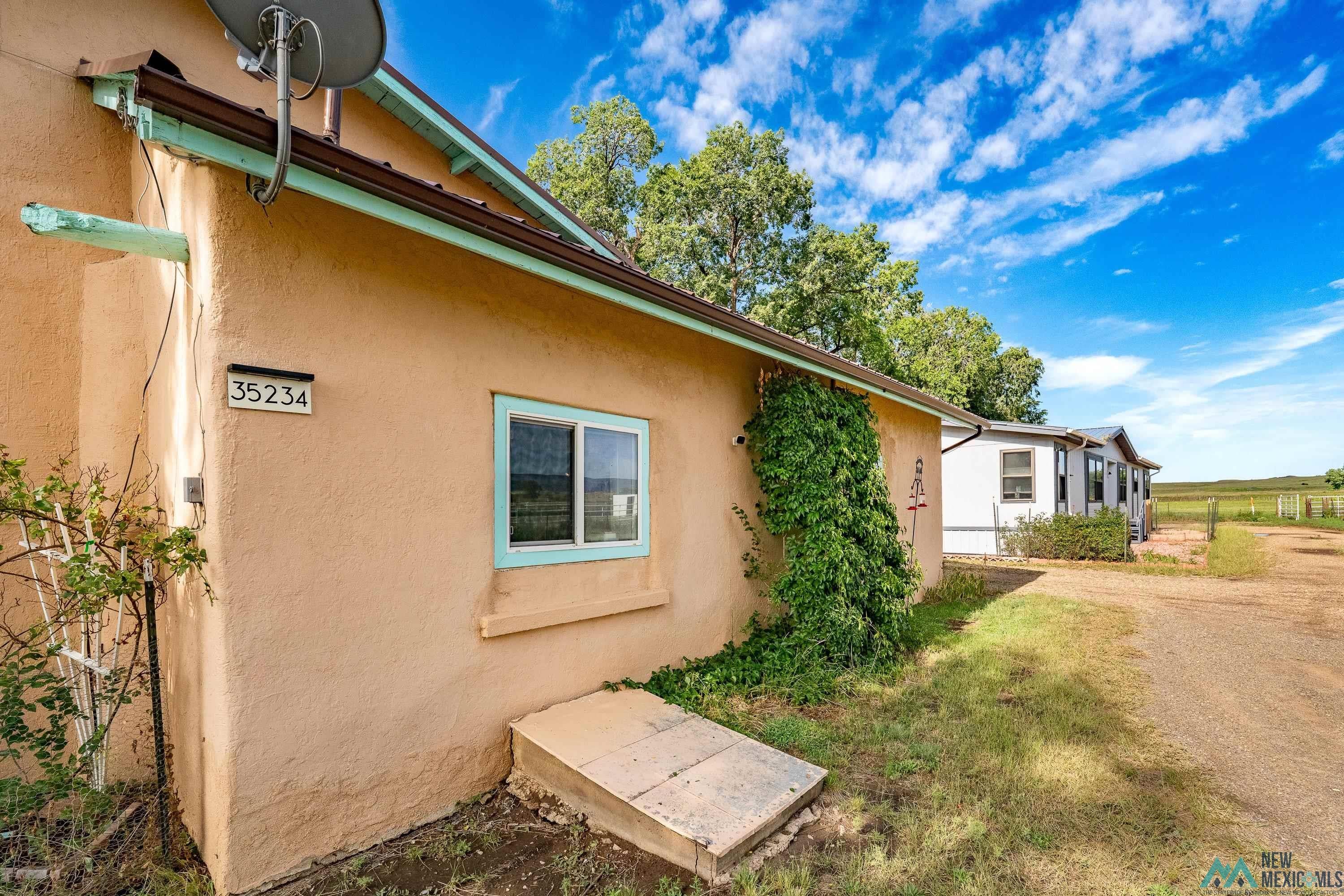 35234 Highway 87 Raton, NM 87740 - Photo 5 of 90 View of property exterior with stucco siding