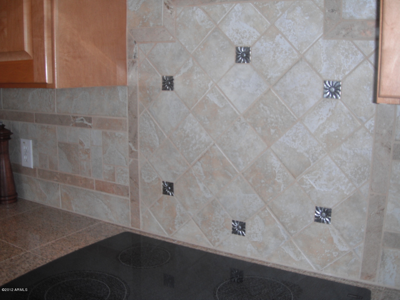 8515 East Montello Road Scottsdale, AZ 85266 - Photo 15 of 20 Stone backsplash with pewter inserts