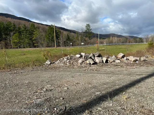 a view of a fountain in front of a house