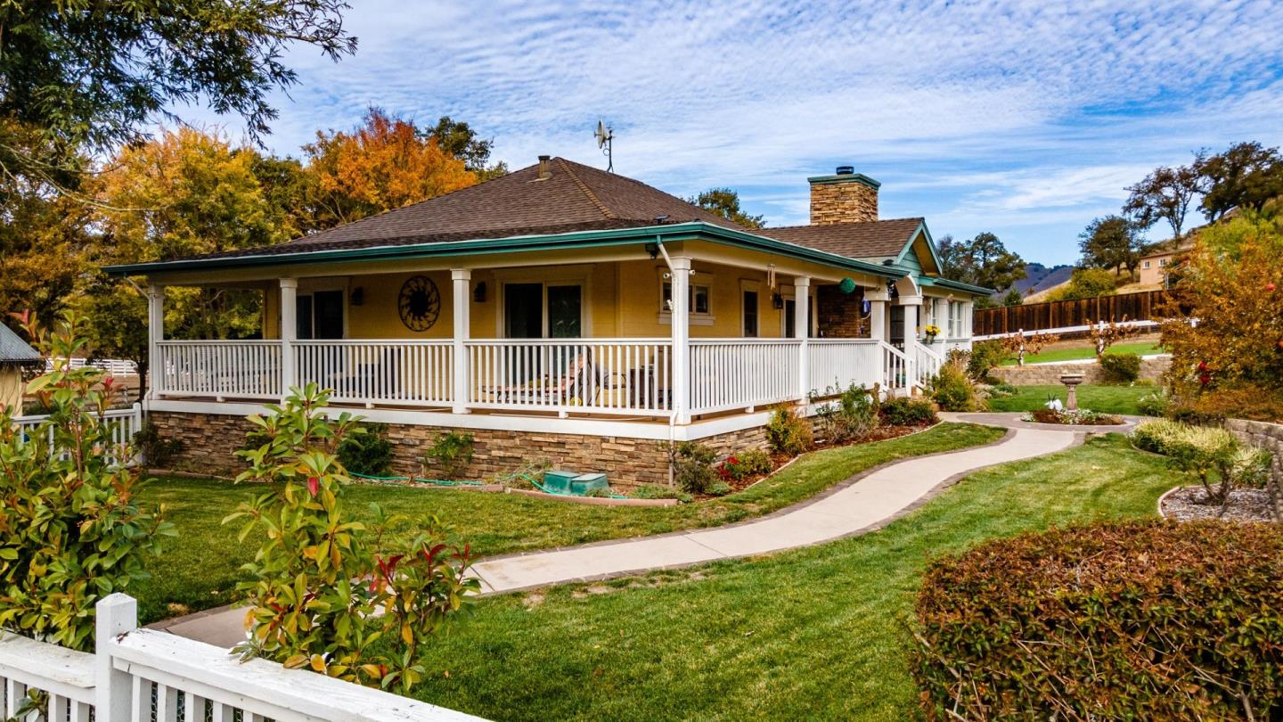 9110 Burchell Road Gilroy, CA 95020 - Photo 12 of 52 a front view of a house with a yard