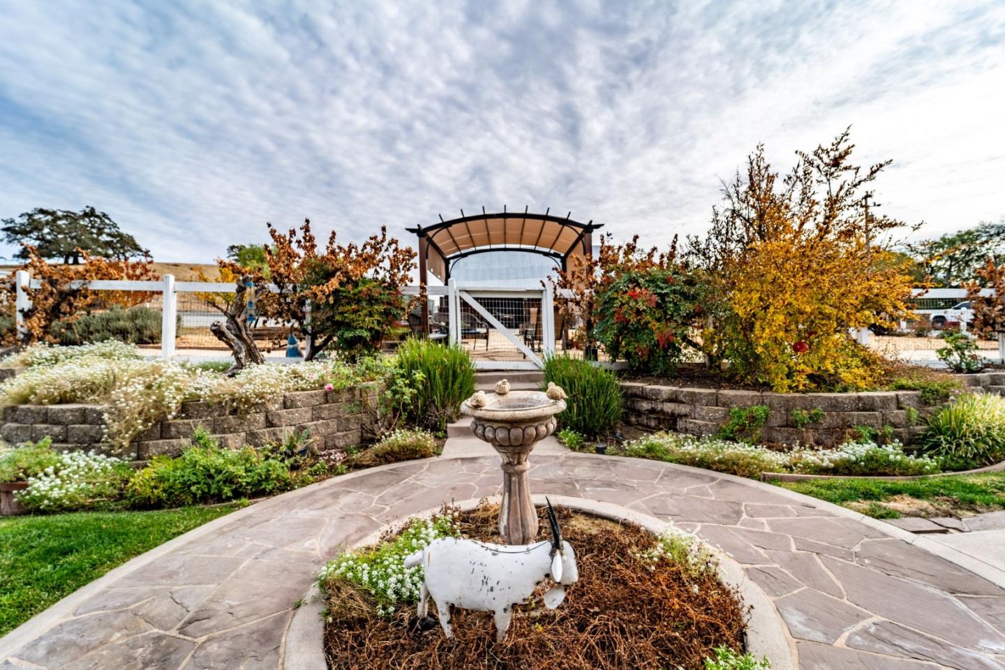 9110 Burchell Road Gilroy, CA 95020 - Photo 16 of 52 a front view of a house with a yard
