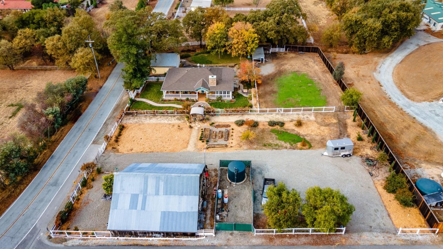 9110 Burchell Road Gilroy, CA 95020 - Photo 2 of 52 an aerial view of a house with a swimming pool