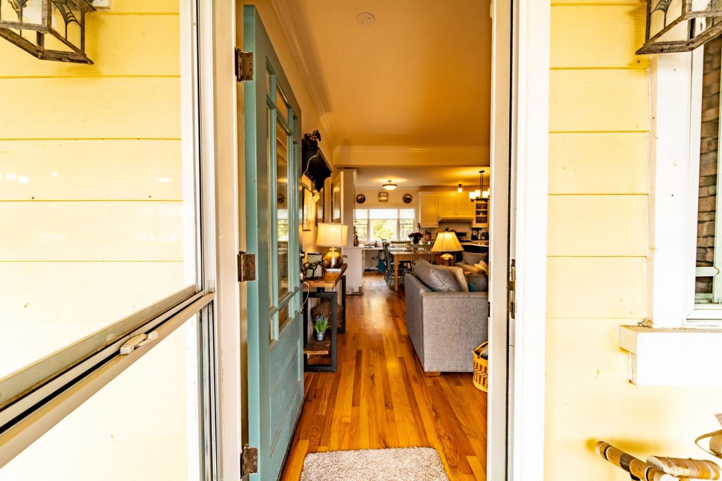9110 Burchell Road Gilroy, CA 95020 - Photo 27 of 52 a view of a living room and a floor to ceiling window
