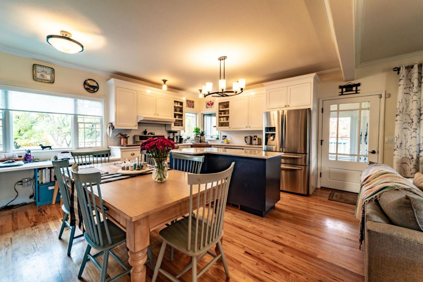 9110 Burchell Road Gilroy, CA 95020 - Photo 29 of 52 a view of a dining room with furniture window and wooden floor