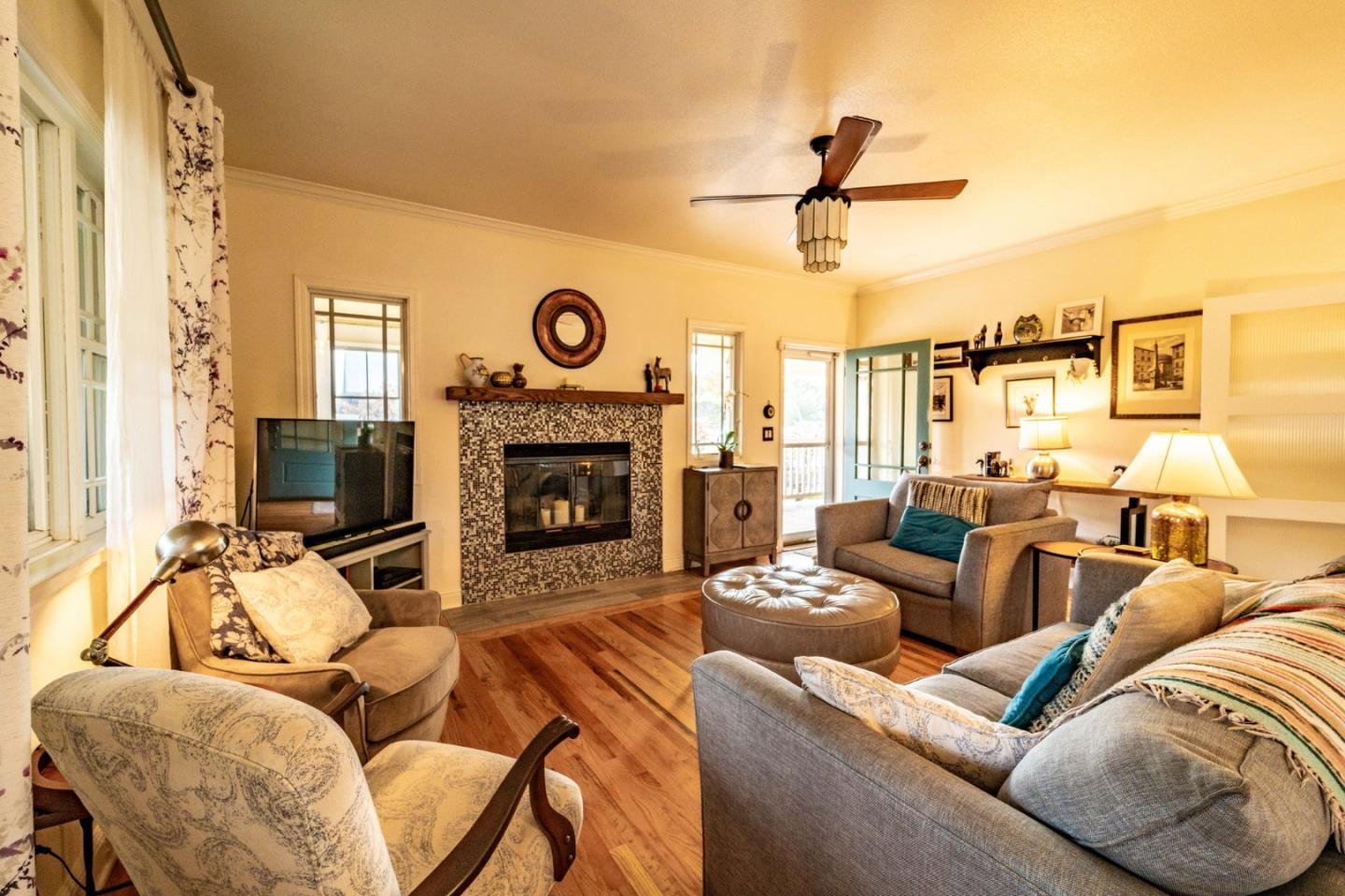 9110 Burchell Road Gilroy, CA 95020 - Photo 30 of 52 a living room with furniture and a fireplace