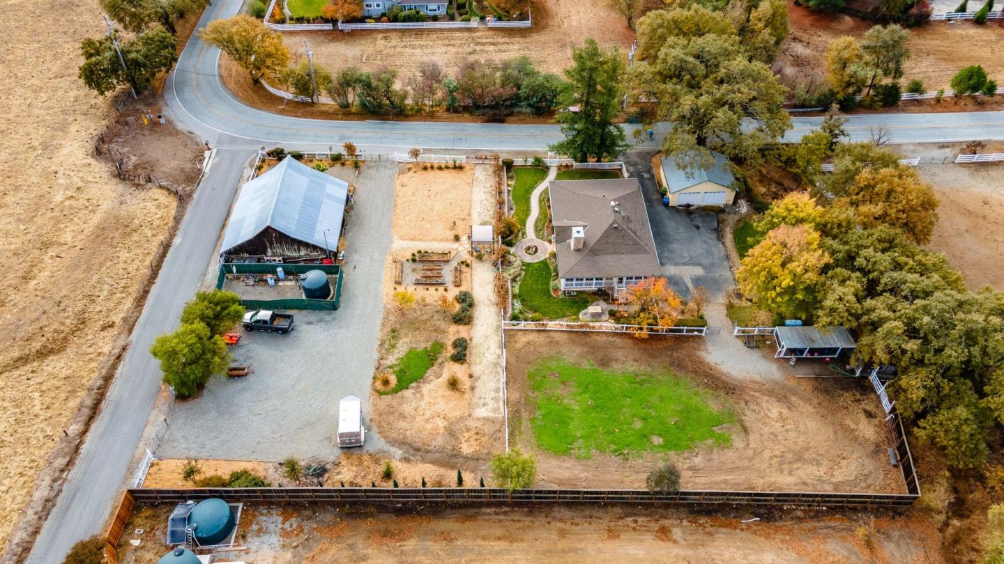 9110 Burchell Road Gilroy, CA 95020 - Photo 3 of 52 an aerial view of a house with a swimming pool