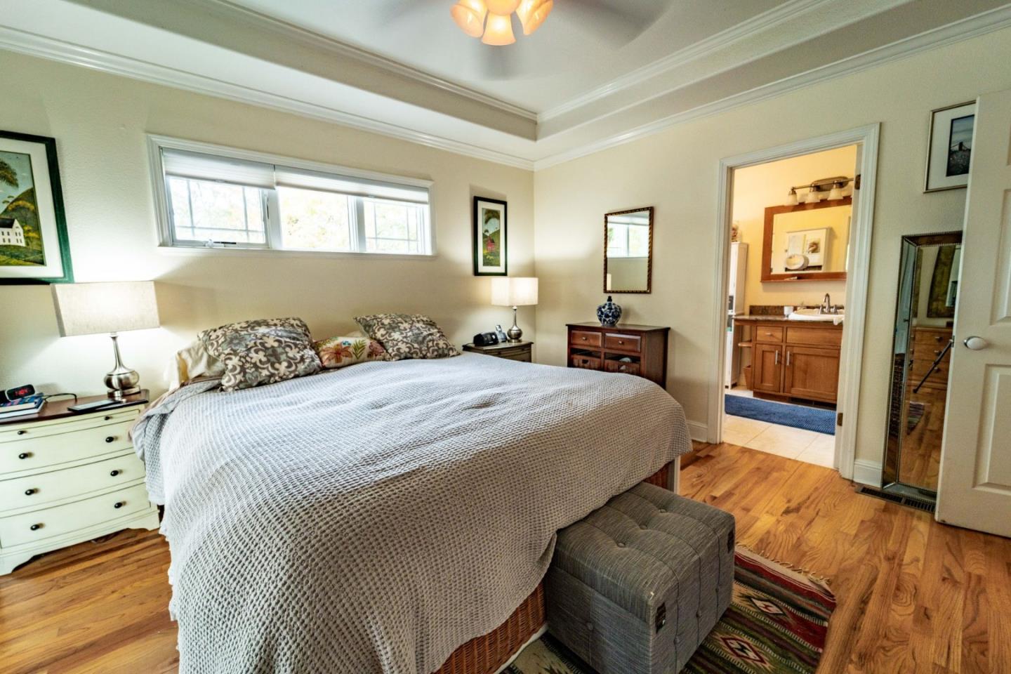 9110 Burchell Road Gilroy, CA 95020 - Photo 39 of 52 a bedroom with a bed and wooden floor