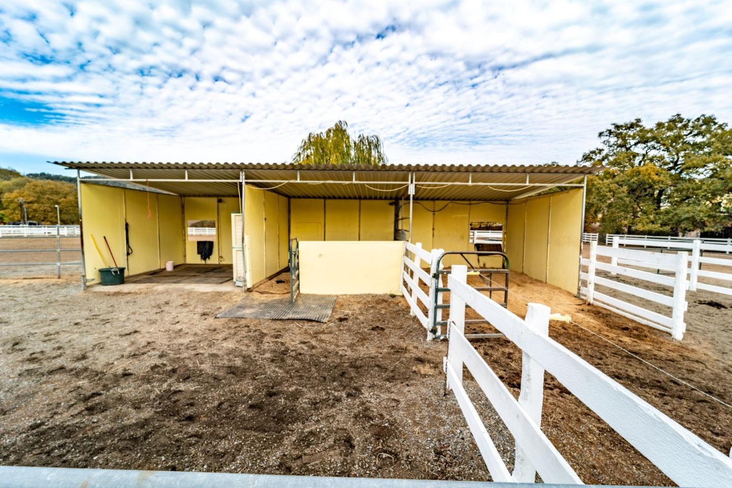 9110 Burchell Road Gilroy, CA 95020 - Photo 45 of 52 a view of a house with wooden fence