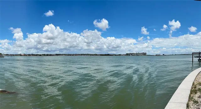 a bathroom with a light fixture and a fireplace