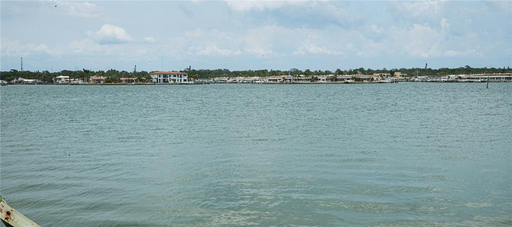 16003 5th Street East Redington Beach, FL 33708 - Photo 13 of 31 a view of a lake view and mountain view in back