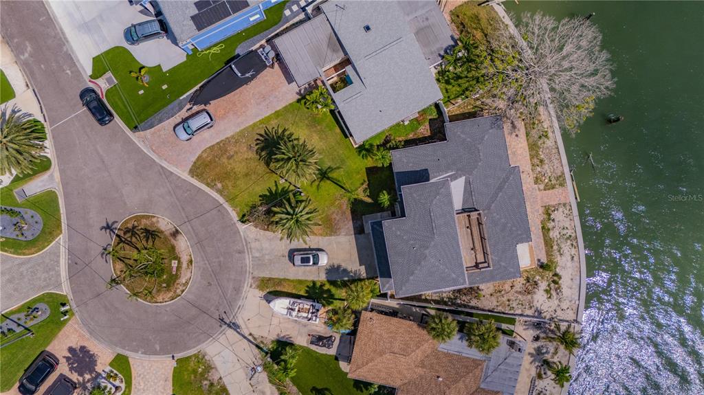 16003 5th Street East Redington Beach, FL 33708 - Photo 23 of 31 an aerial view of residential house with outdoor space and parking