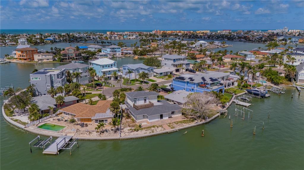 16003 5th Street East Redington Beach, FL 33708 - Photo 27 of 31 an aerial view of a house with a lake view
