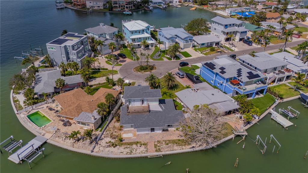 16003 5th Street East Redington Beach, FL 33708 - Photo 31 of 31 an aerial view of a house with outdoor space swimming pool and lake view