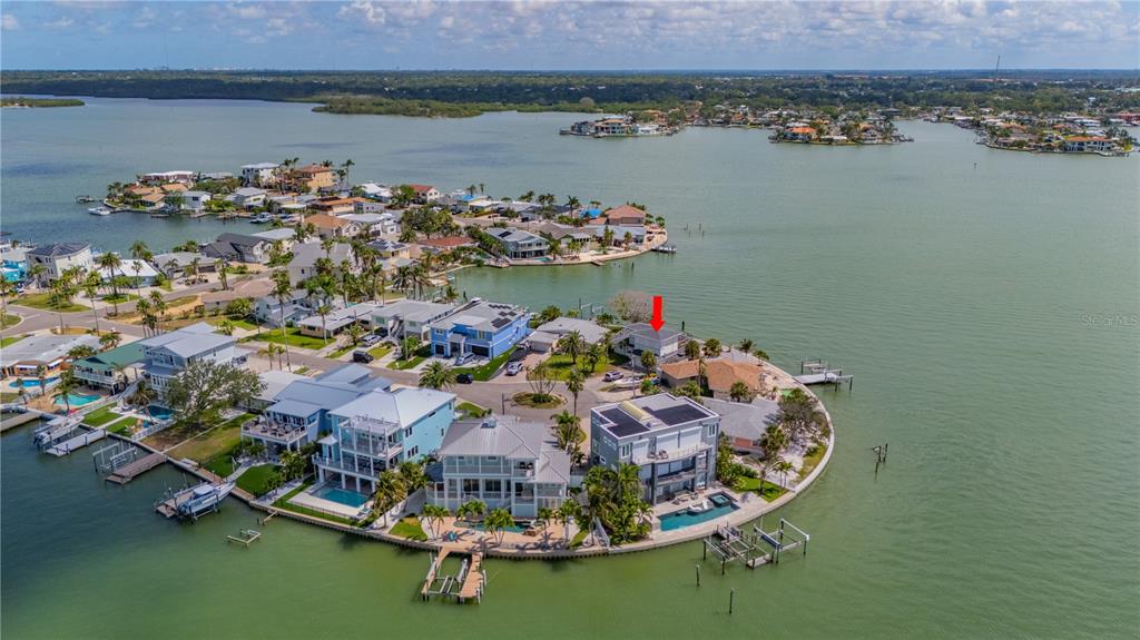 16003 5th Street East Redington Beach, FL 33708 - Photo 8 of 31 an aerial view of a house with a lake view
