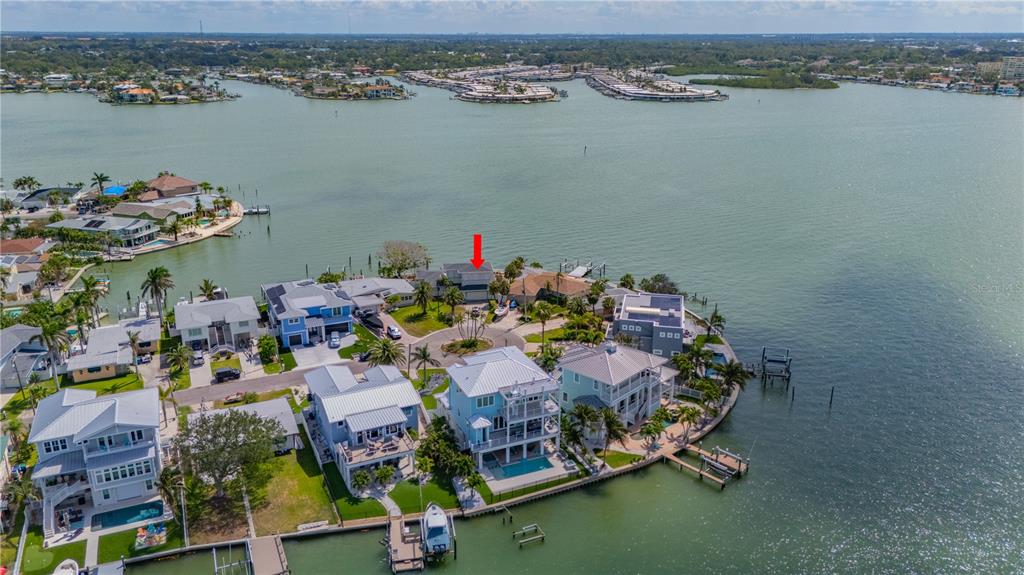 16003 5th Street East Redington Beach, FL 33708 - Photo 9 of 31 a aerial view of a houses with a lake