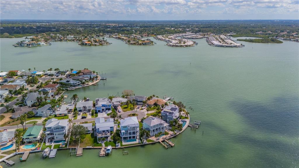 16003 5th Street East Redington Beach, FL 33708 - Photo 10 of 31 an aerial view of a house with a lake view