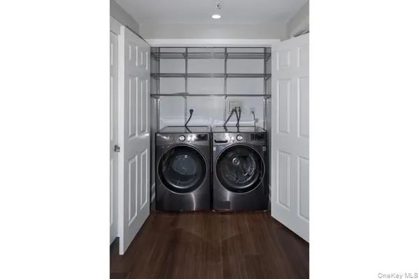a utility room with dryer and washer