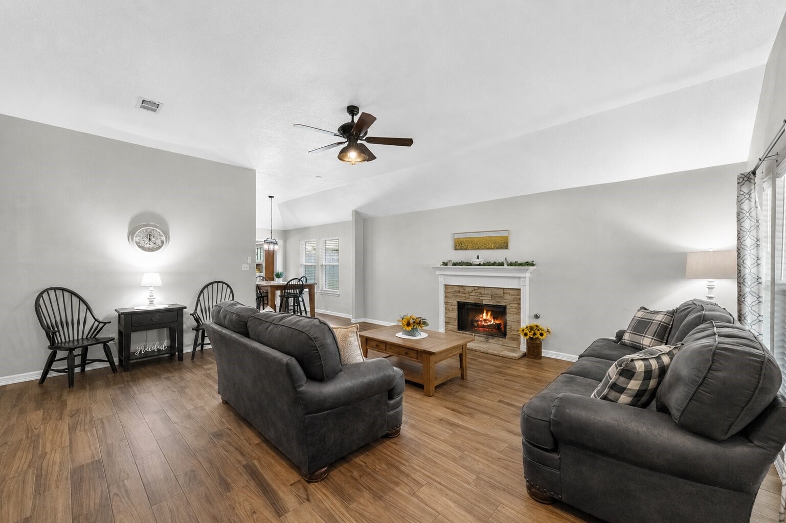 606 Walnut Street Sweeny, TX 77480 - Photo 4 of 28 a living room with furniture and a fireplace