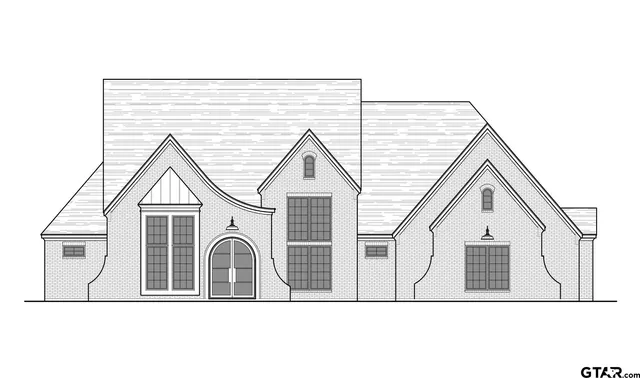 a view of front of house with large windows