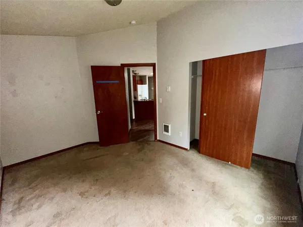 an empty room with closet