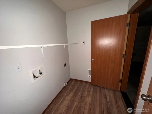 a view of elevator with wooden floor